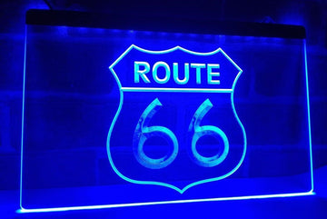 Blue Route 66 highway shield LED sign with large 66 numerals lit on clear acrylic