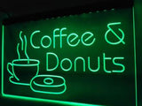 A neon green LED sign that reads 'COFFEE & DONUTS' with a graphic of a cup of coffee and a donut.